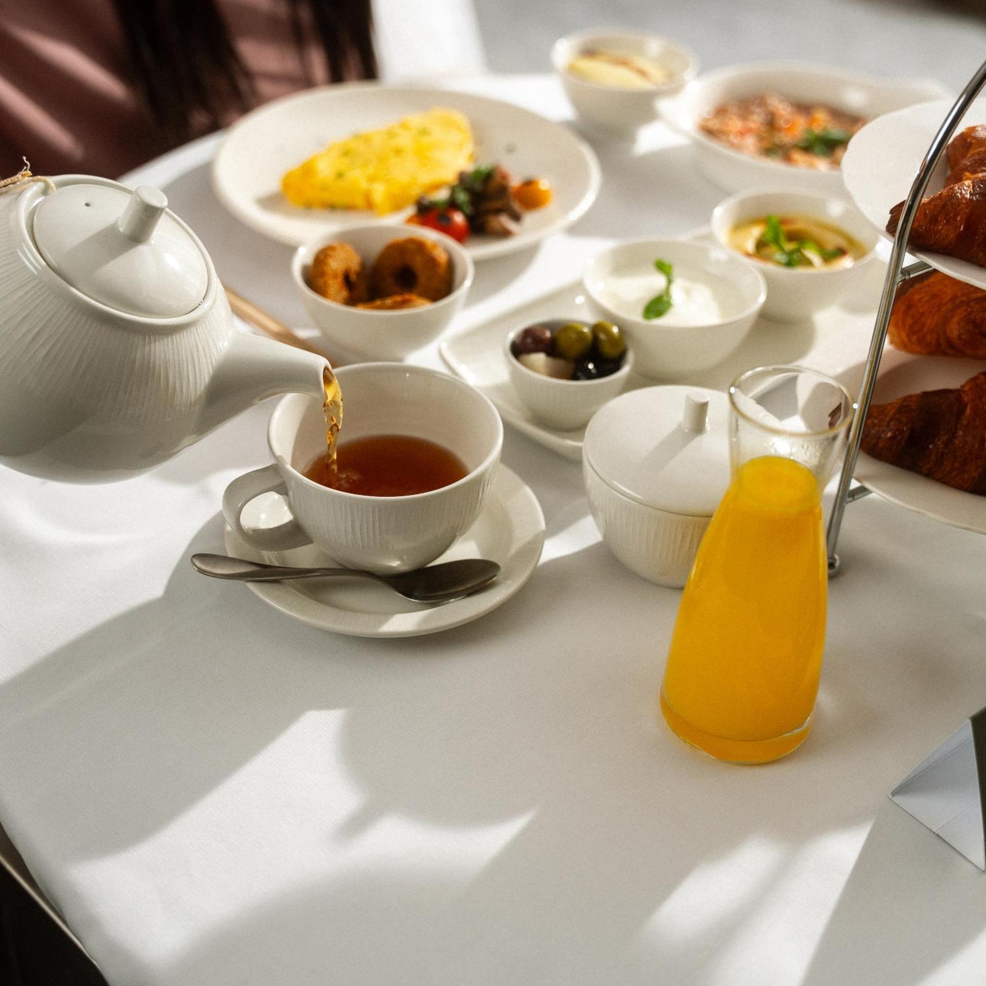 Jareed Hotel Riyad Extérieur photo A breakfast table